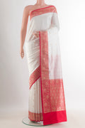 Pure Silk White Banarasi Katan Saree with Zari Butta on the body and Zari Border.  displayed on a mannequin