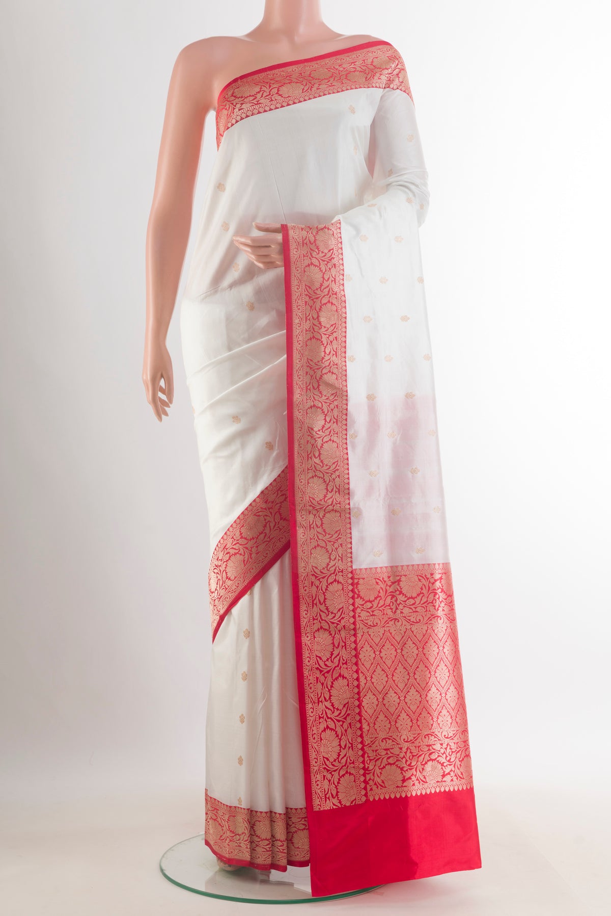 Pure Silk White Banarasi Katan Saree with Zari Butta on the body and Zari Border.  displayed on a mannequin