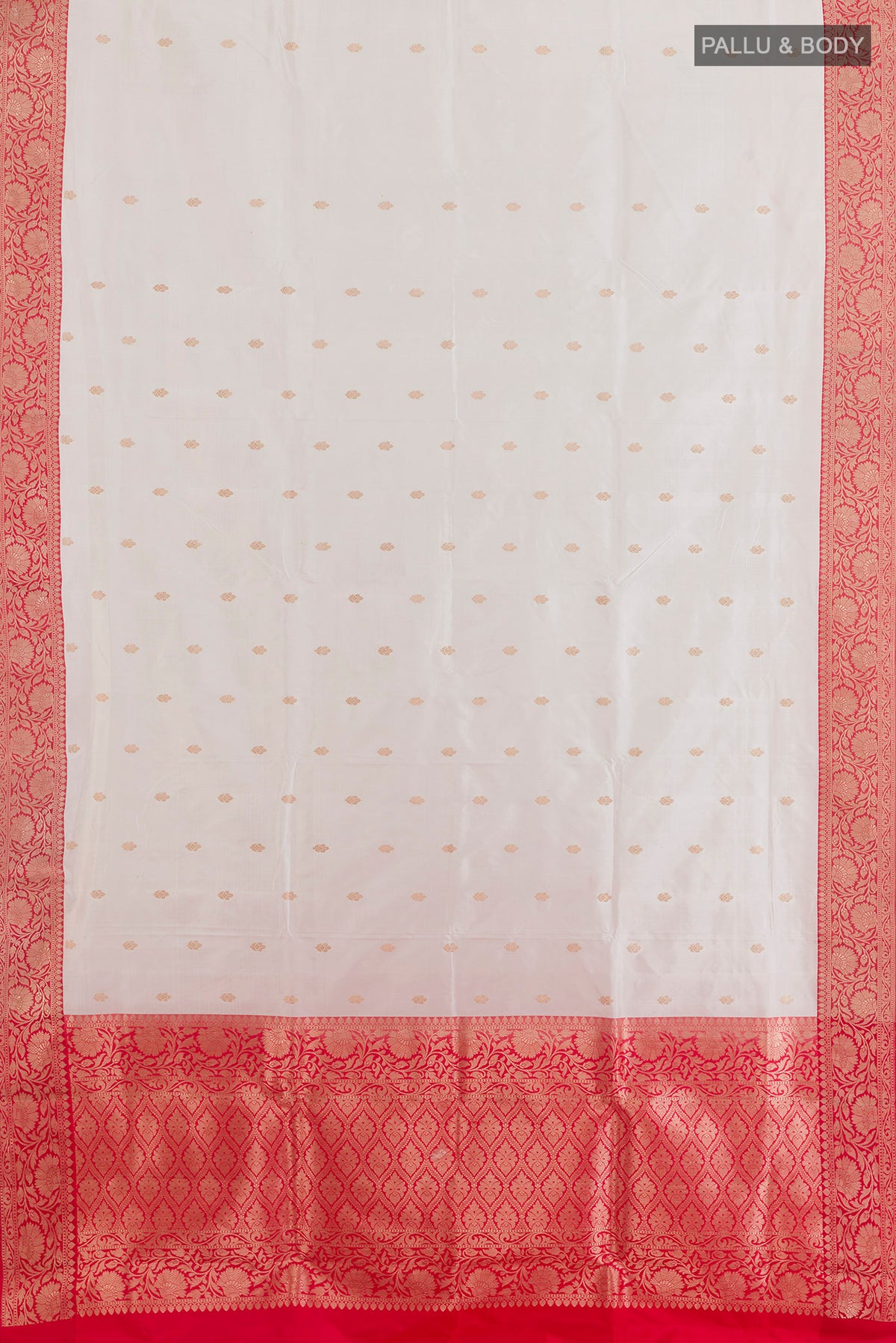 Flat view of Pure Silk White Banarasi Katan Saree with Zari Butta on the body and Zari Border. 