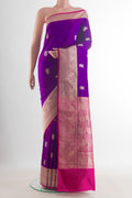 Pure Silk Purple Banarasi Katan Saree with Zari Butta on the body and Zari Border.  displayed on a mannequin