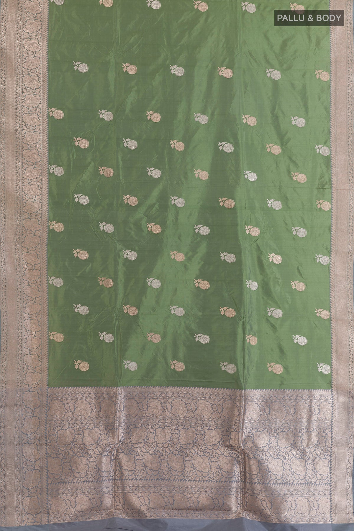 Flat view of Pure Silk Sage Green Banarasi Katan Saree with Zari Butta on the body and Zari Border. 