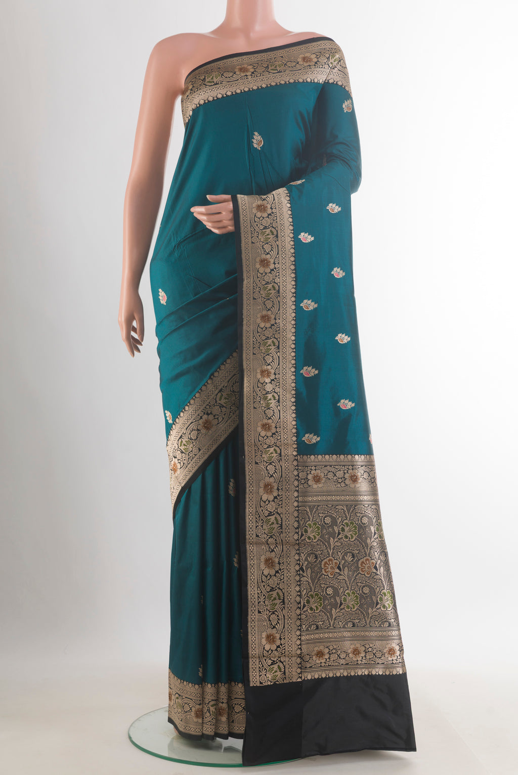 Pure Silk Blue Soft Saree with Zari Butta on the body and Zari Border.  displayed on a mannequin