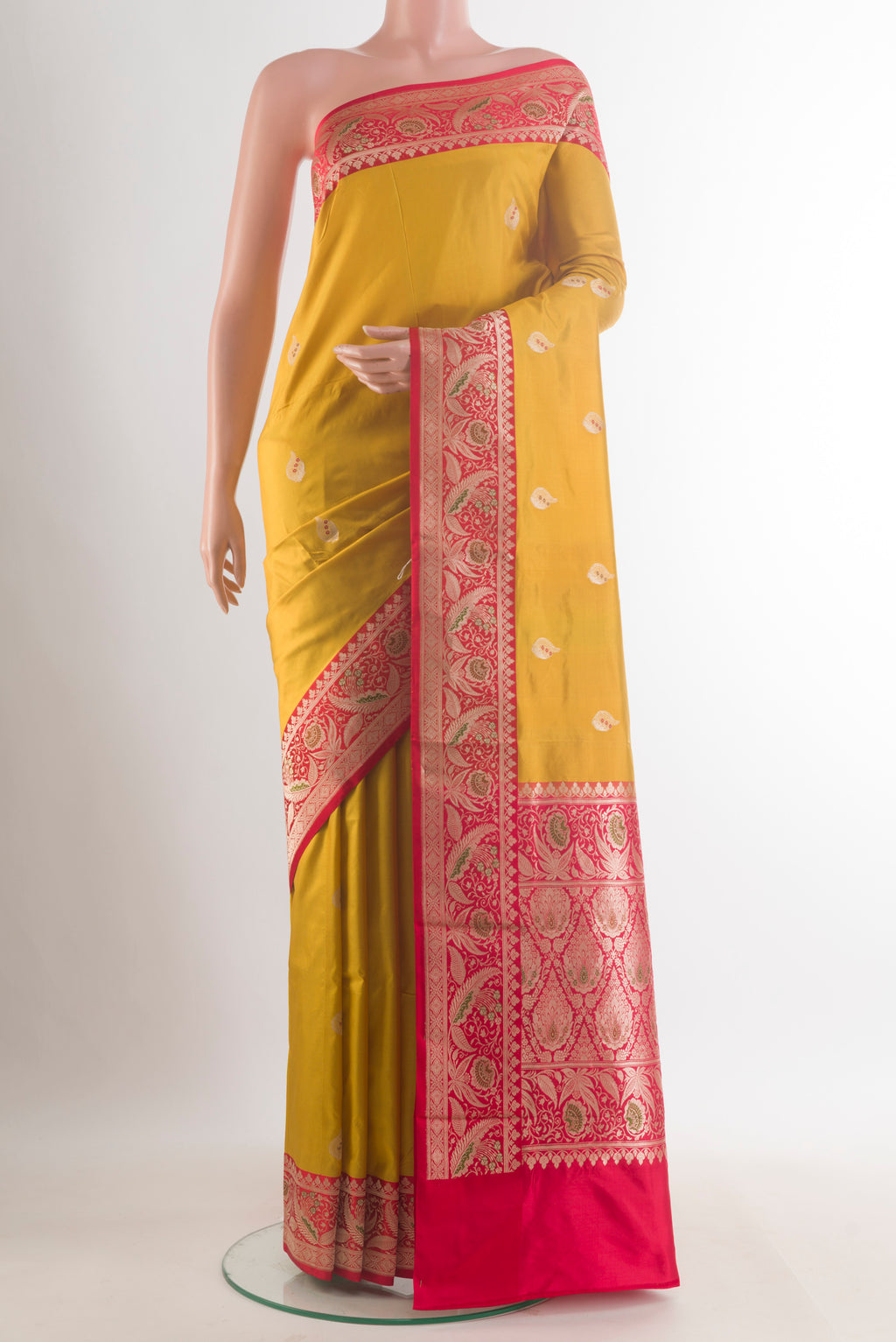 Pure Silk Yellow Banarasi Katan Saree with Zari Butta on the body and Zari Border.  displayed on a mannequin