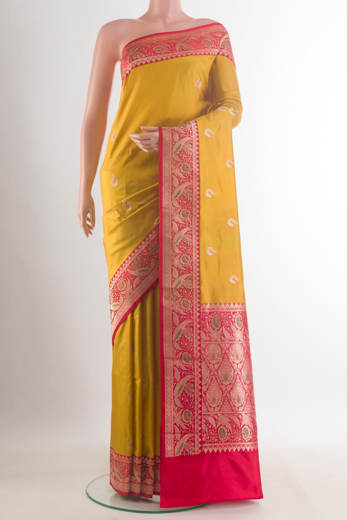 Pure Silk Yellow Banarasi Katan Saree with Zari Butta on the body and Zari Border.  displayed on a mannequin