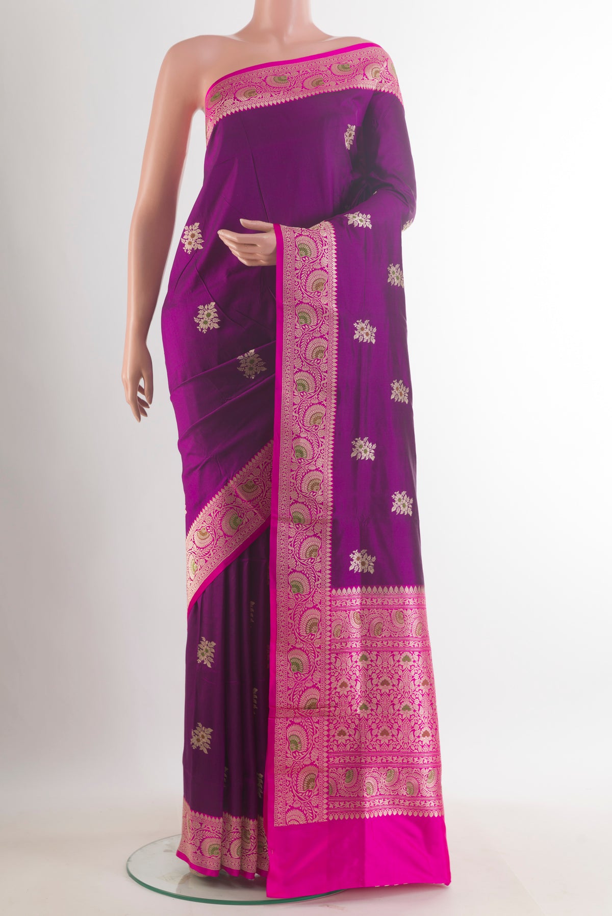 Pure Silk Purple Banarasi Katan Saree with Zari Butta on the body and Zari Border.  displayed on a mannequin