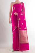 Pink Banarasi Saree with Zari Butta on the body and Zari Border.  displayed on a mannequin