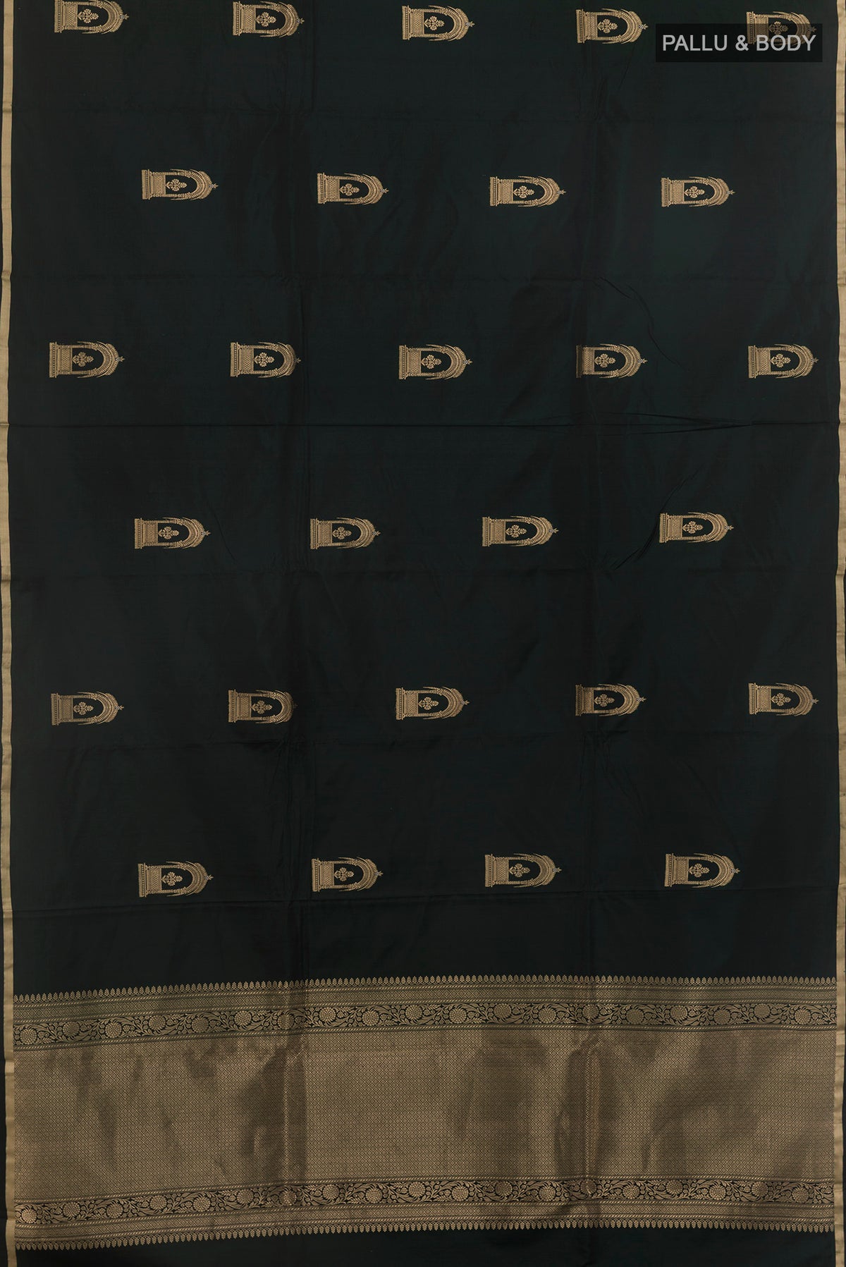 Flat view of Bottle Green Banarasi Saree with Zari Butta on the body and Zari Border. 