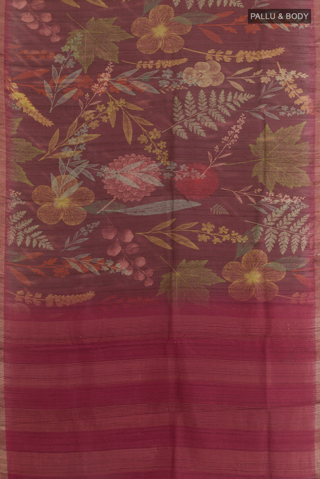 Flat view of Brown Tussar Saree with Printed design on the body and Zari Border. 