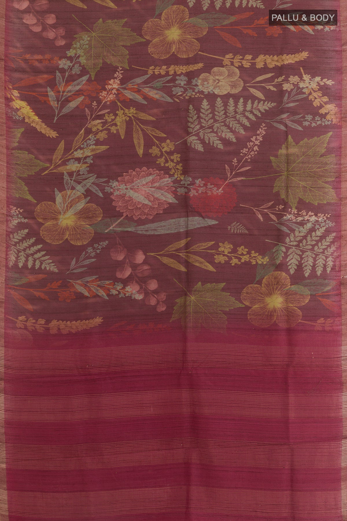 Flat view of Brown Tussar Saree with Printed design on the body and Zari Border. 