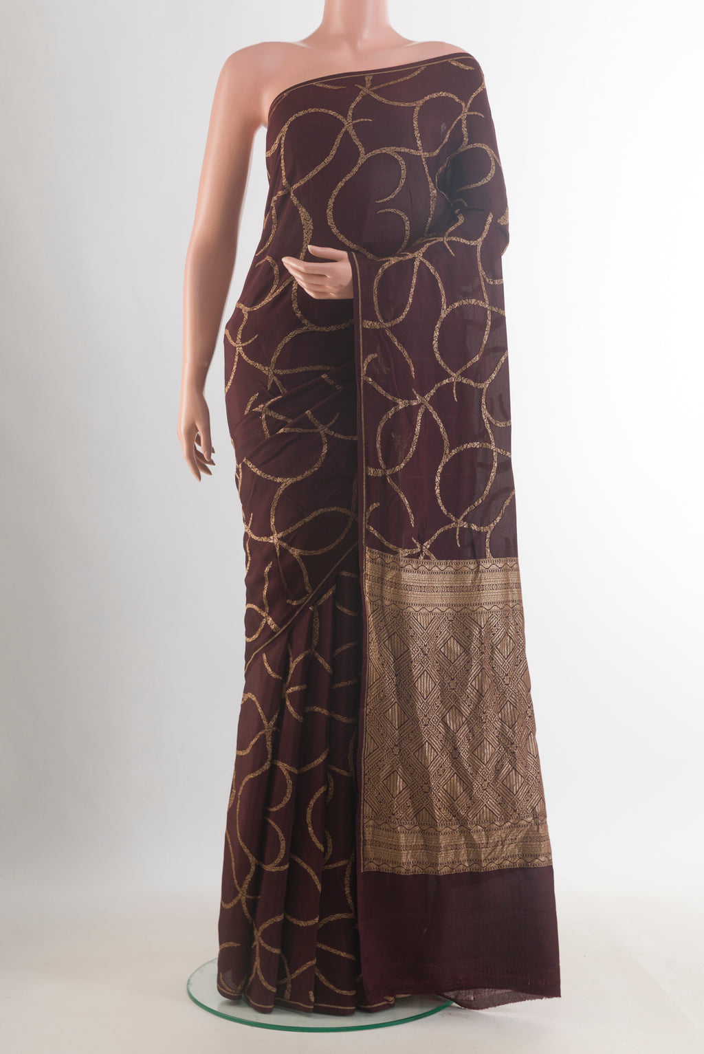 Coffee Brown Banarasi Georgette Saree with Zari Brocade on the body and Zari Border.  displayed on a mannequin