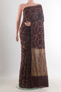Coffee Brown Banarasi Georgette Saree with Zari Brocade on the body and Zari Border.  displayed on a mannequin