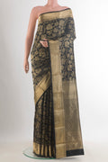 Pure Silk Black Kanchipuram Saree with Zari Brocade on the body and Zari Border.  displayed on a mannequin