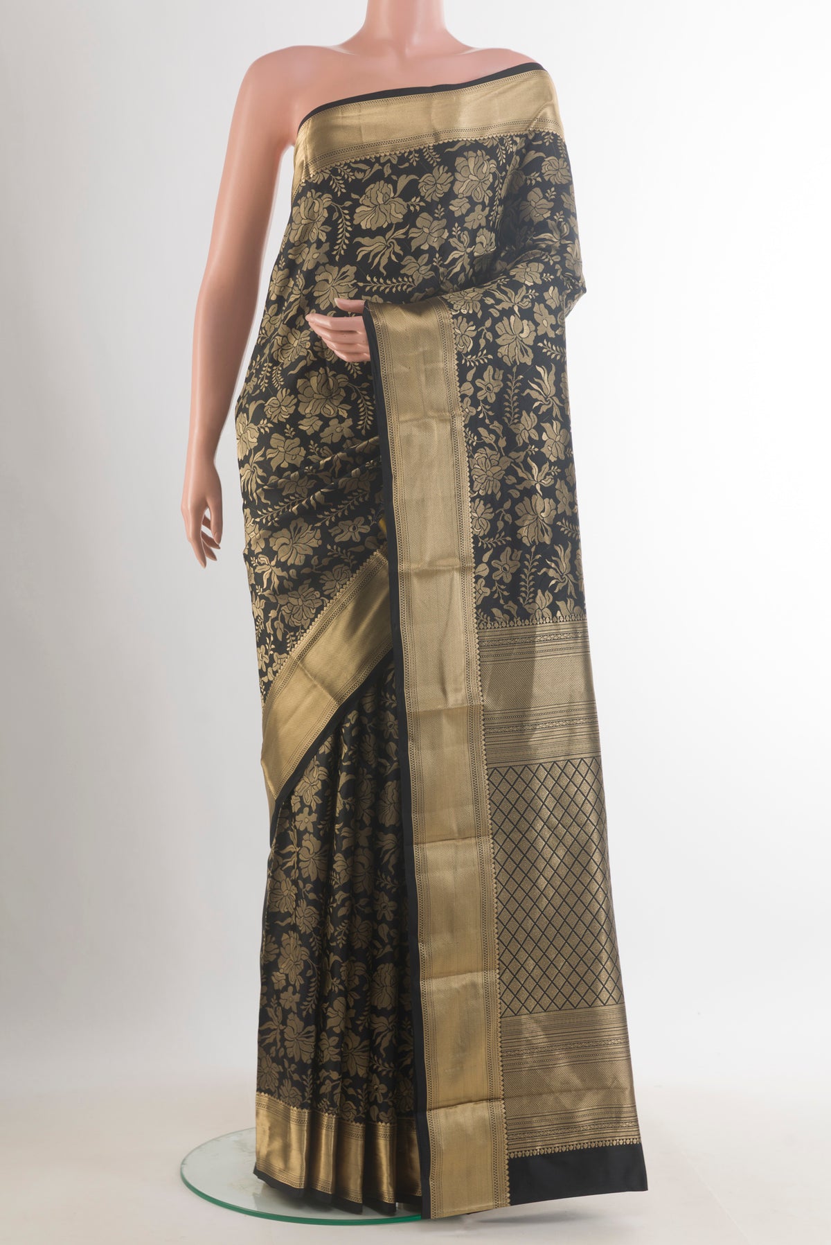 Pure Silk Black Kanchipuram Saree with Zari Brocade on the body and Zari Border.  displayed on a mannequin