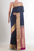 Pure Silk Navy Blue Soft Saree with Plain Body and Zari Border.  displayed on a mannequin