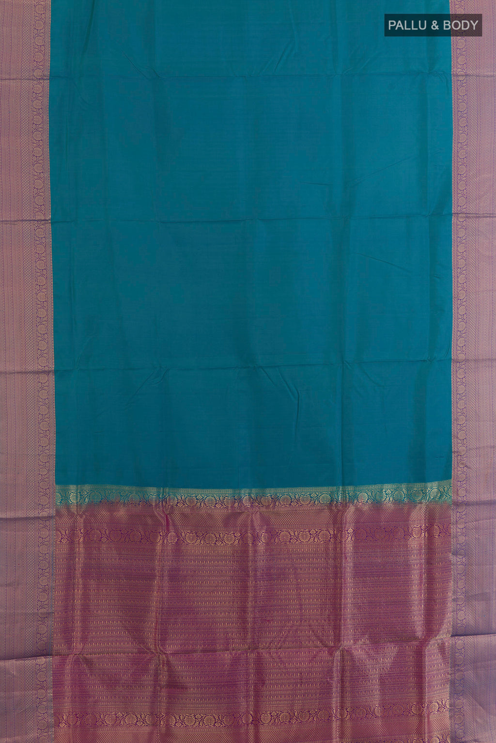 Flat view of Pure Silk Blue Soft Saree with Plain Body and Zari Border. 