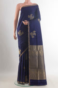 Pure Silk Navy Blue Soft Saree with Zari Butta on the body and Zari Border.  displayed on a mannequin