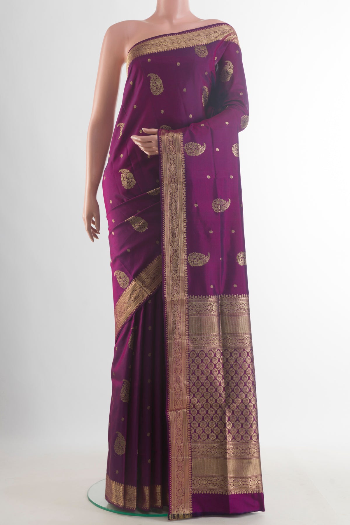 Pure Silk Purple Soft Saree with Zari Butta on the body and Zari Border.  displayed on a mannequin