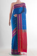 Pure Silk Blue Soft Saree with Zari Butta on the body and Zari Border.  displayed on a mannequin