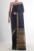 Pure Silk Navy Blue Kanchipuram Saree with Zari Butta on the body and Zari Border.  displayed on a mannequin