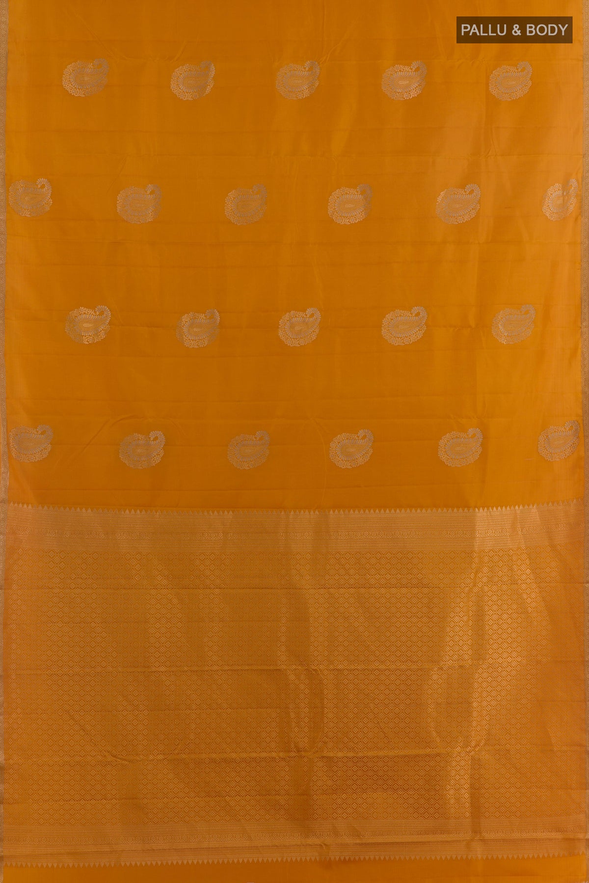 Flat view of Pure Silk Mustard Kanchipuram Saree with Zari Butta on the body and Zari Border. 
