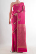 Pure Silk Pink Kanchipuram Saree with Zari Butta on the body and Zari Border.  displayed on a mannequin