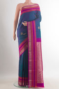 Pure Silk Peacock Blue Kanchipuram Saree with Zari Butta on the body and Zari Border.  displayed on a mannequin