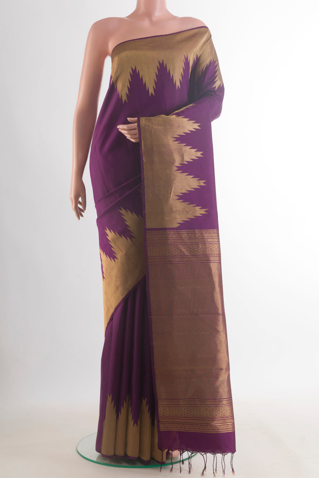 Pure Silk Purple Kanchipuram Saree with Plain Body and Temple Border.  displayed on a mannequin