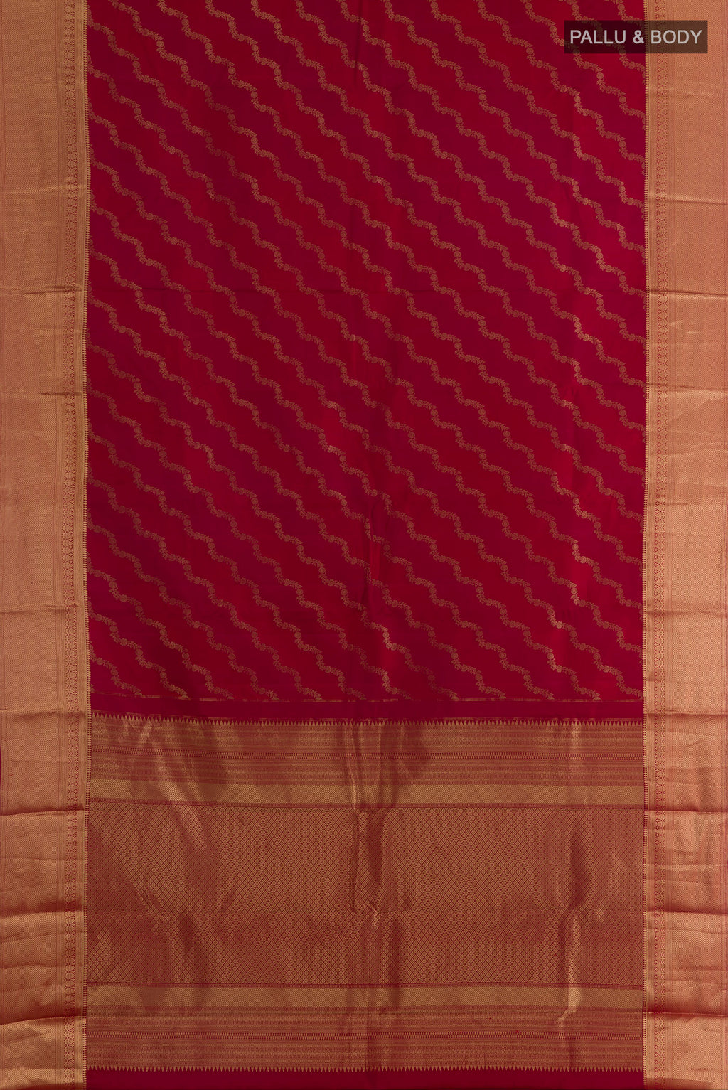 Flat view of Pure Silk Red Kanjivaram Saree with Zari Brocade on the body and Zari Border. 