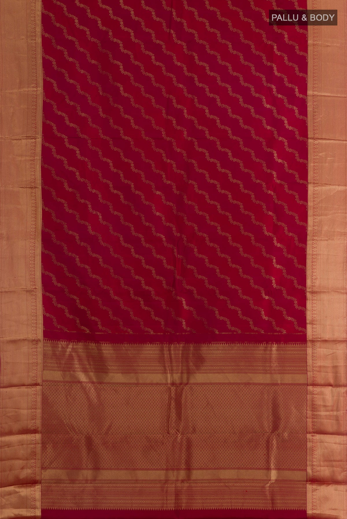 Flat view of Pure Silk Red Kanjivaram Saree with Zari Brocade on the body and Zari Border. 