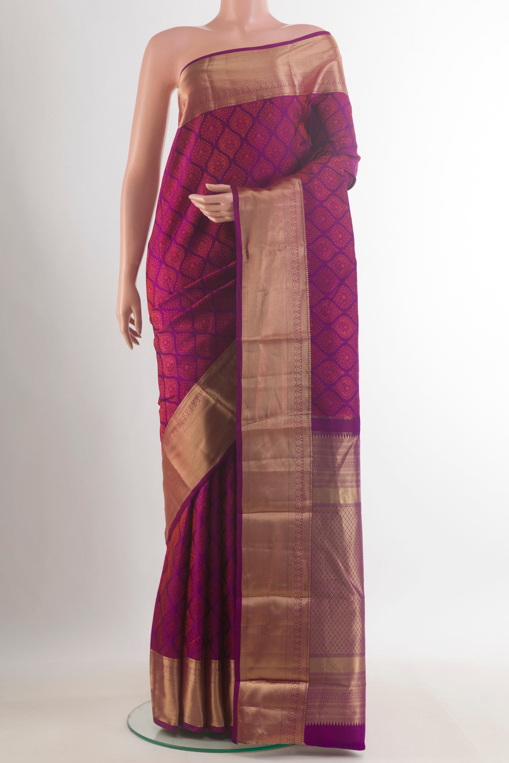 Pure Silk Purple Kanchipuram Saree with Jacquard design on the body and Zari Border.  displayed on a mannequin