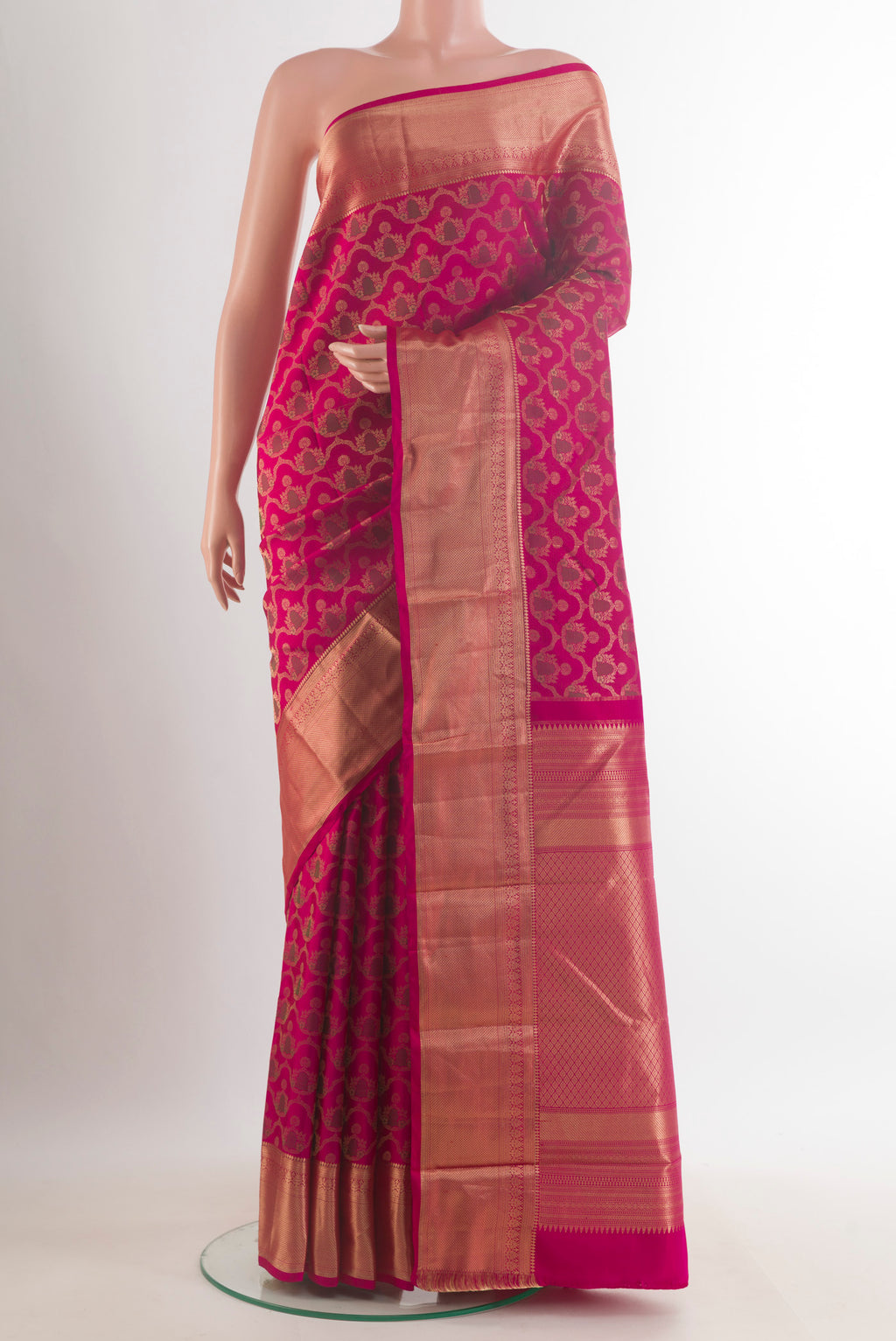 Pure Silk Pink Kanchipuram Saree with Zari Brocade on the body and Zari Border.  displayed on a mannequin