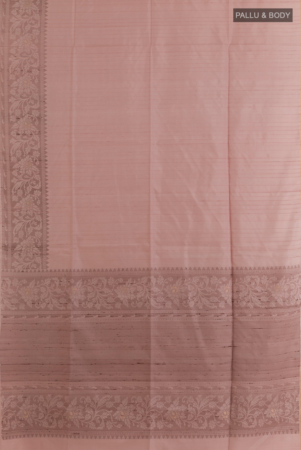 Flat view of Pure Silk Rose Gold Soft Saree with Stripes on the body and Zari Border. 
