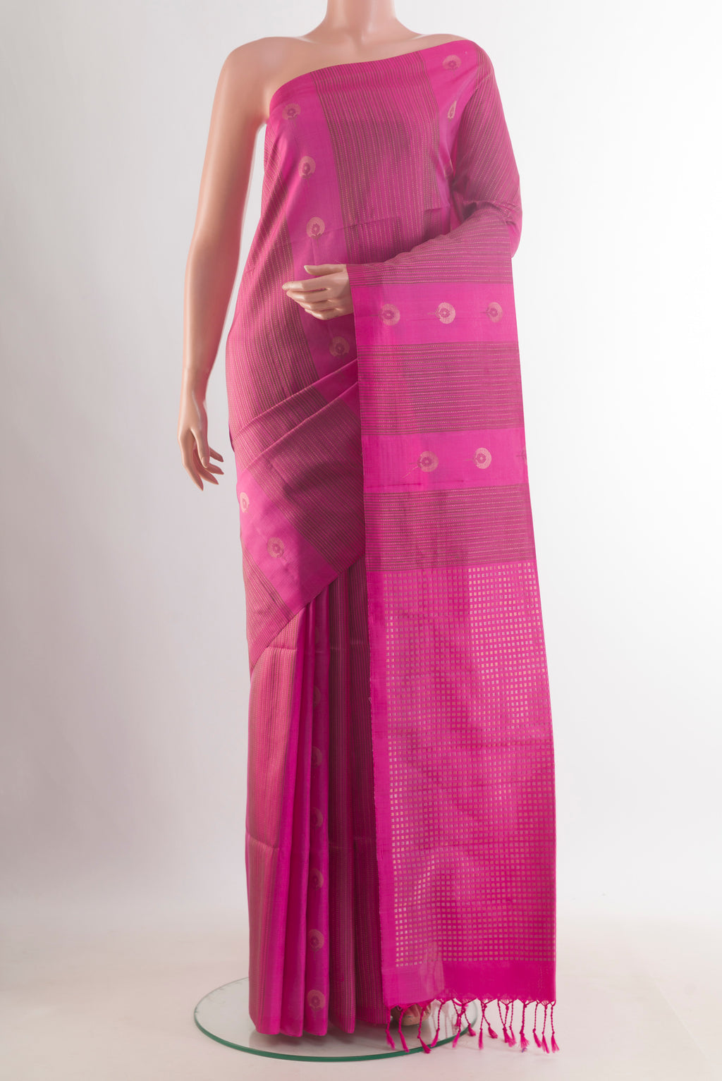 Pure Silk Pink Soft Saree with Stripes on the body and Without Border.  displayed on a mannequin