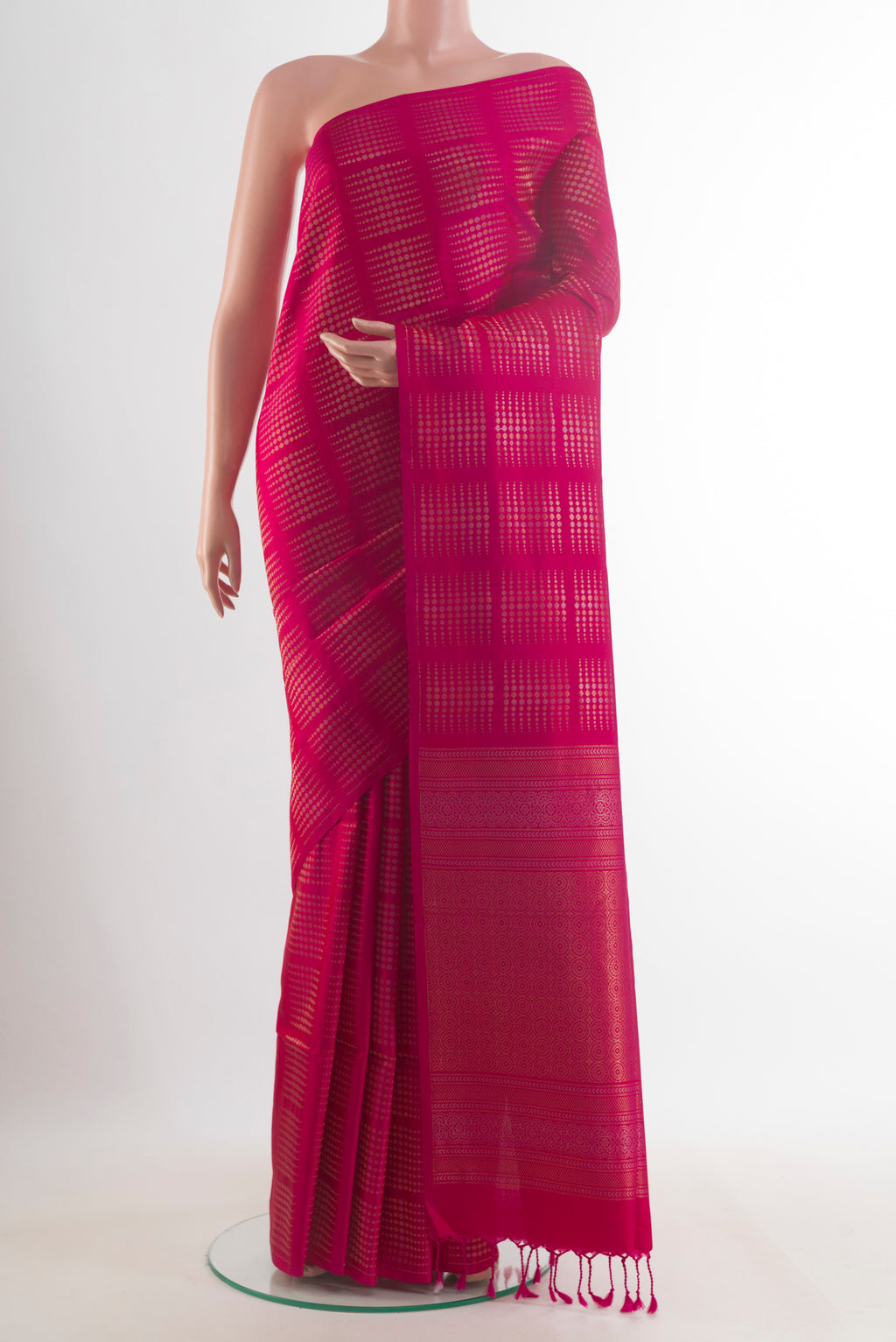 Pure Silk Pink Soft Saree with Zari Brocade on the body and Without Border.  displayed on a mannequin
