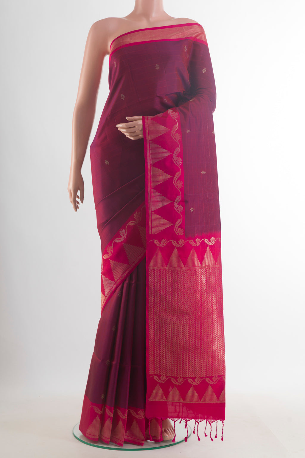 Pure Silk Purple Soft Saree with Zari Butta on the body and Zari Border.  displayed on a mannequin