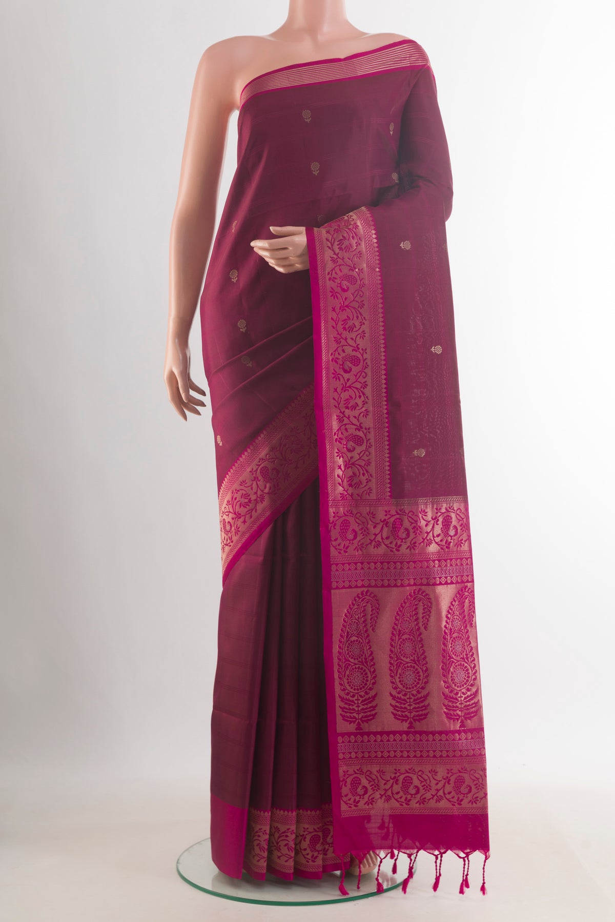Pure Silk Purple Soft Saree with Zari Butta on the body and Zari Border.  displayed on a mannequin