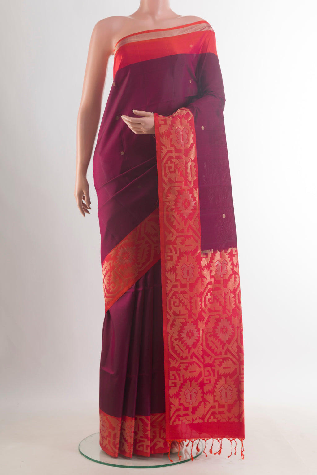 Pure Silk Purple Soft Saree with Zari Butta on the body and Zari Border.  displayed on a mannequin