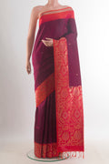 Pure Silk Purple Soft Saree with Zari Butta on the body and Zari Border.  displayed on a mannequin
