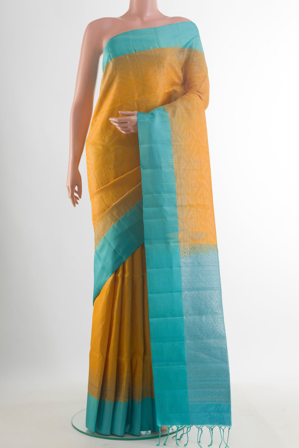 Pure Silk Yellow Soft Saree with Zari Brocade on the body and Zari Border.  displayed on a mannequin