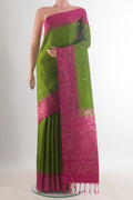 Pure Silk Green Soft Saree with Zari Butta on the body and Zari Border.  displayed on a mannequin