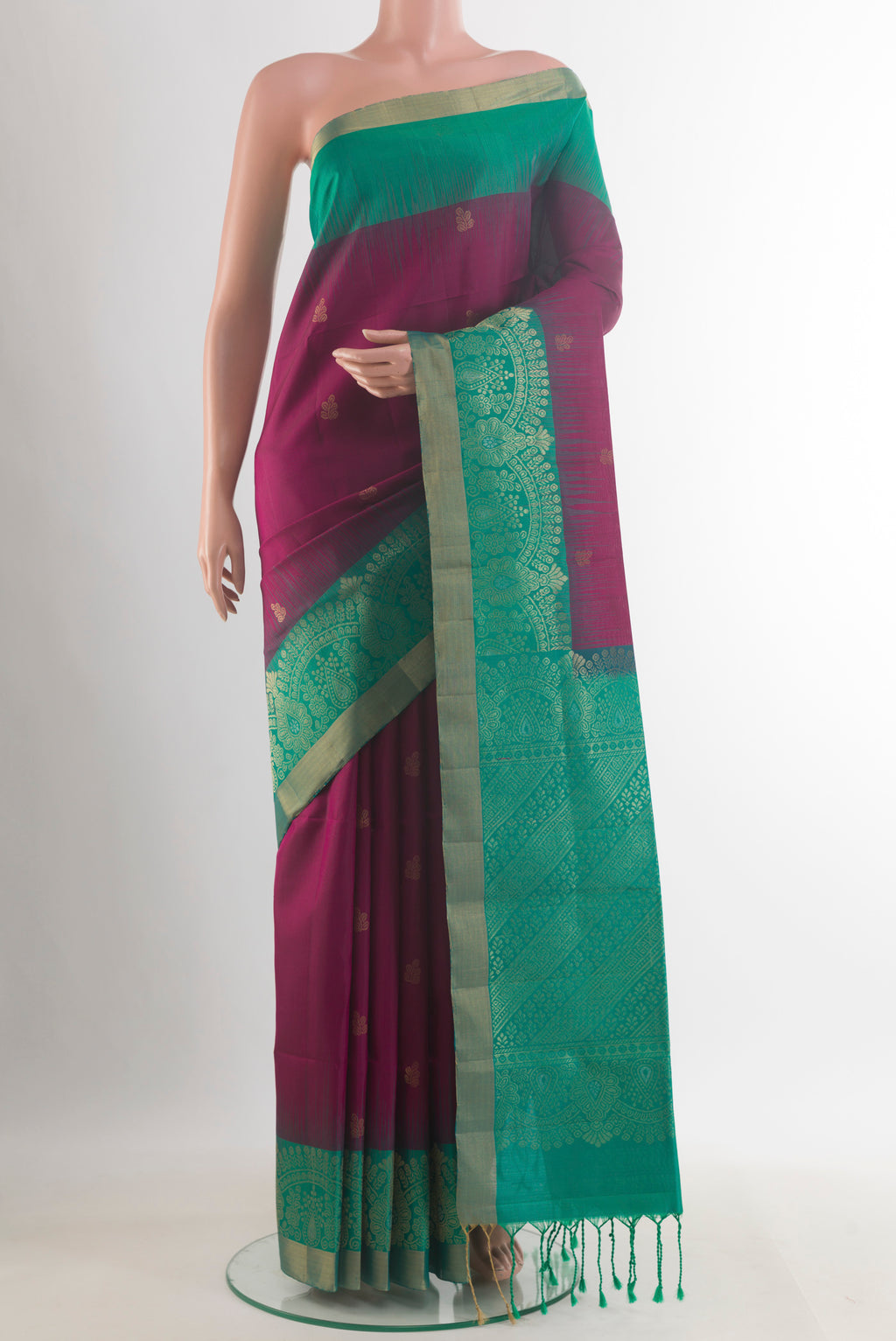 Pure Silk Purple Soft Saree with Zari Butta on the body and Zari Border.  displayed on a mannequin