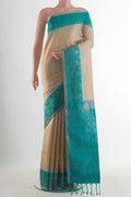 Pure Silk Beige Soft Saree with Stripes on the body and Zari Border.  displayed on a mannequin