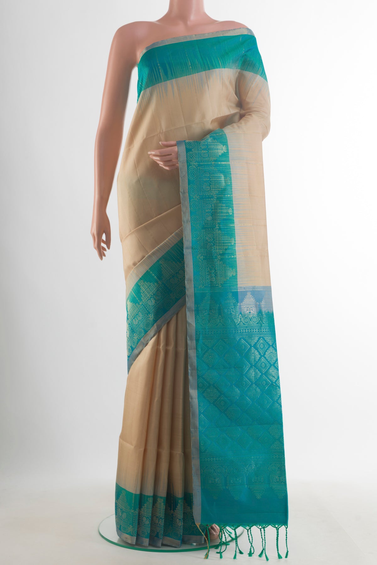Pure Silk Beige Soft Saree with Stripes on the body and Zari Border.  displayed on a mannequin