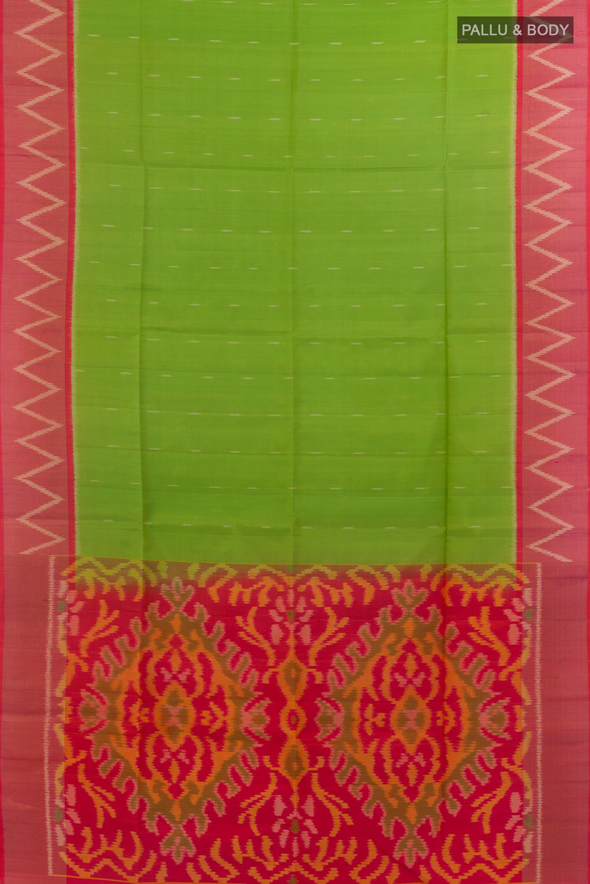 Flat view of Pure Silk Parrot Green Soft Saree with Ikat design on the body and Zari Border. 