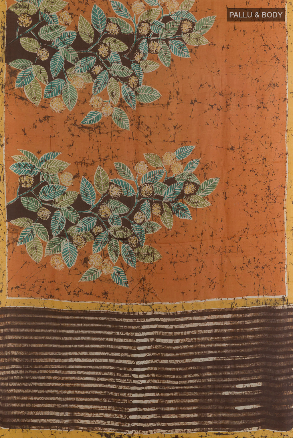 Flat view of Mustard Tussar Saree with Batik Print on the body and Embroidered Border. 