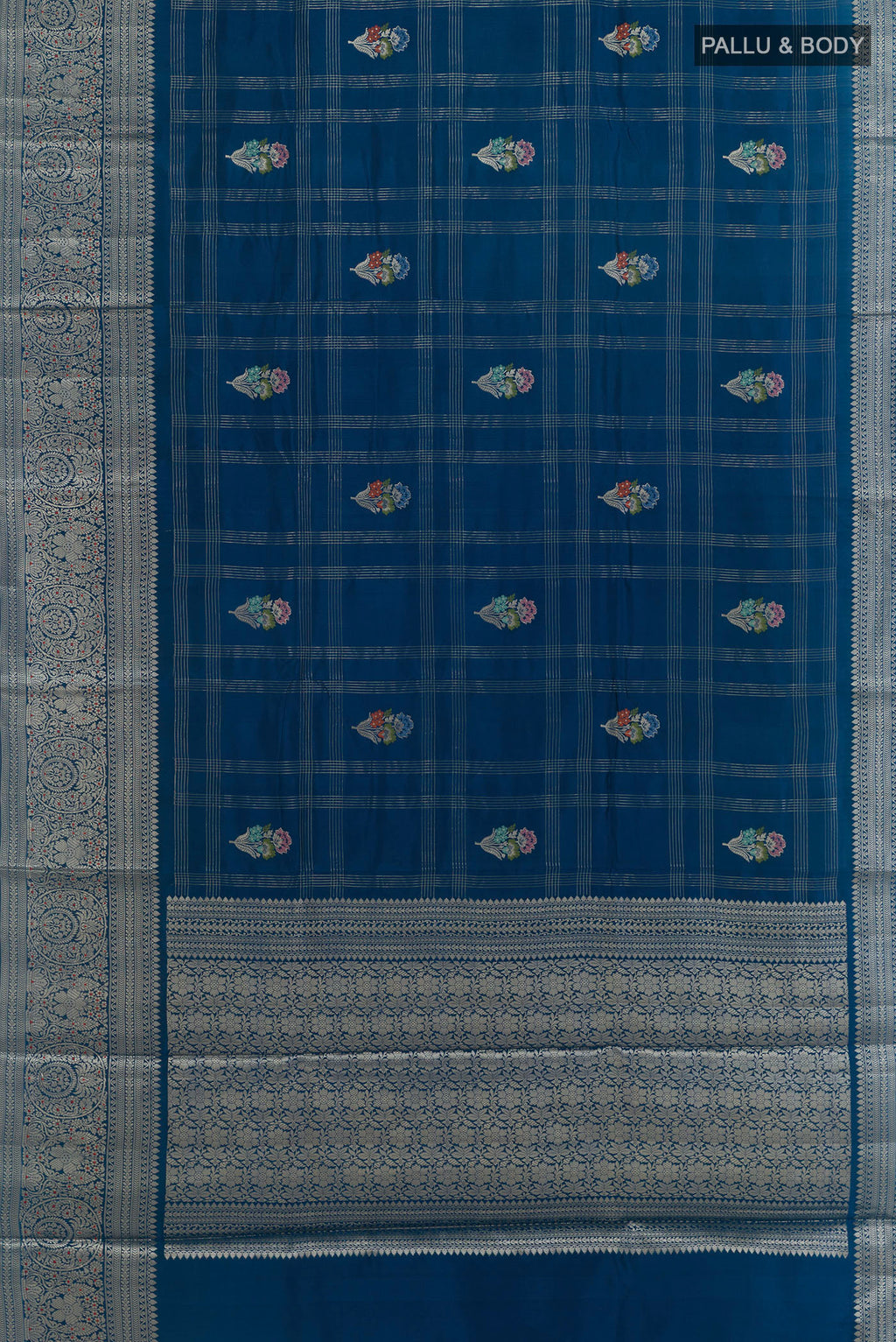 Flat view of Pure Silk Blue Banarasi Tussar Saree with Checked design on the body and Zari Border. 