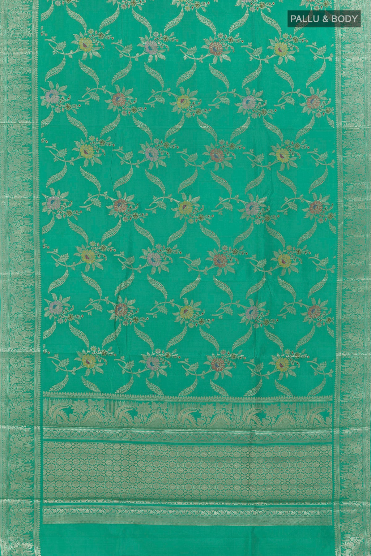 Flat view of Sea Green Tussar Saree with Zari Brocade on the body and Zari Border. 