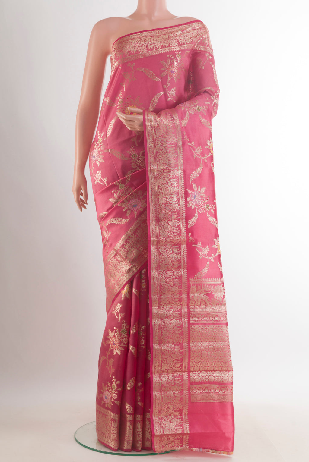 Coral Tussar Saree with Zari Brocade on the body and Zari Border.  displayed on a mannequin