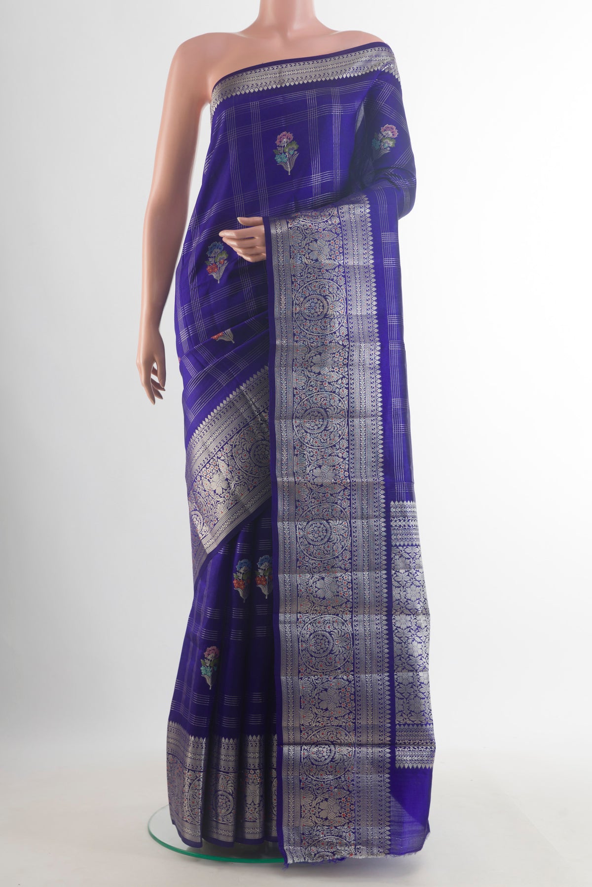 Pure Silk Blue Banarasi Tussar Saree with Checked design on the body and Zari Border.  displayed on a mannequin