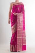Pure Silk Pink Banarasi Tussar Saree with Checked design on the body and Zari Border.  displayed on a mannequin